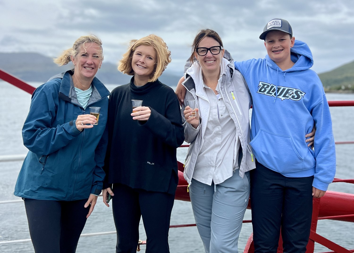 family and friends enjoying Drambuie on ferry crossing