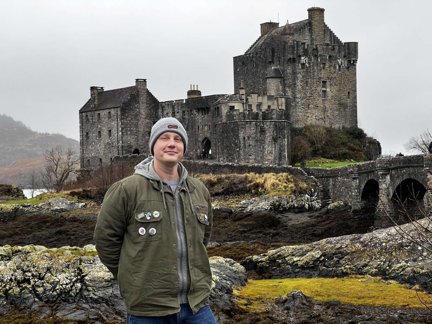 guest outside Eilean Donan Castle Scottish Highlands