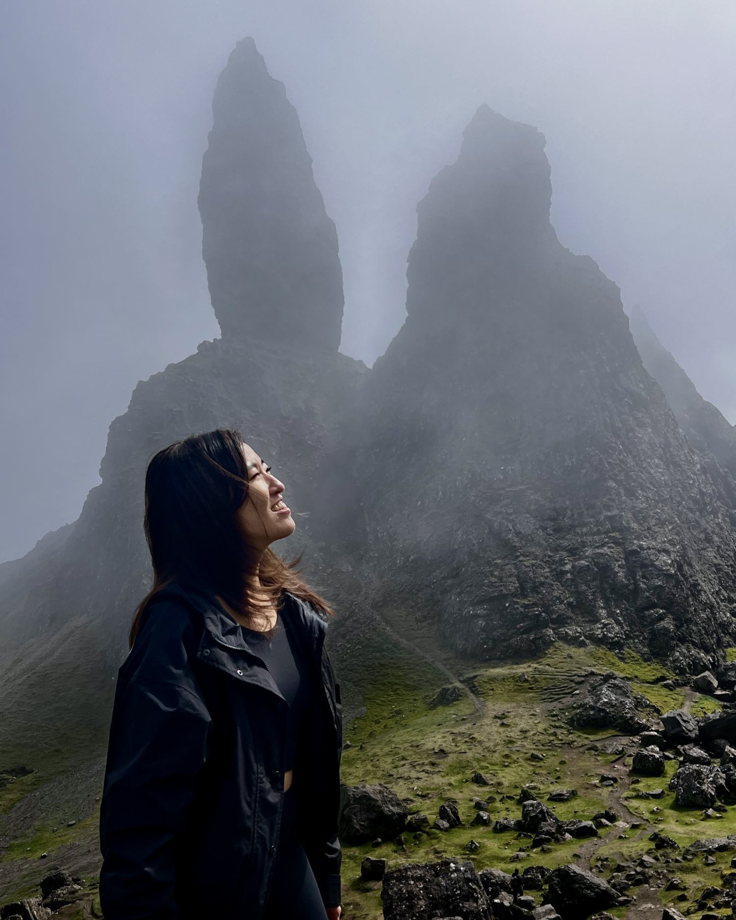 visitor exploring dramatic Isle of Skye scenery